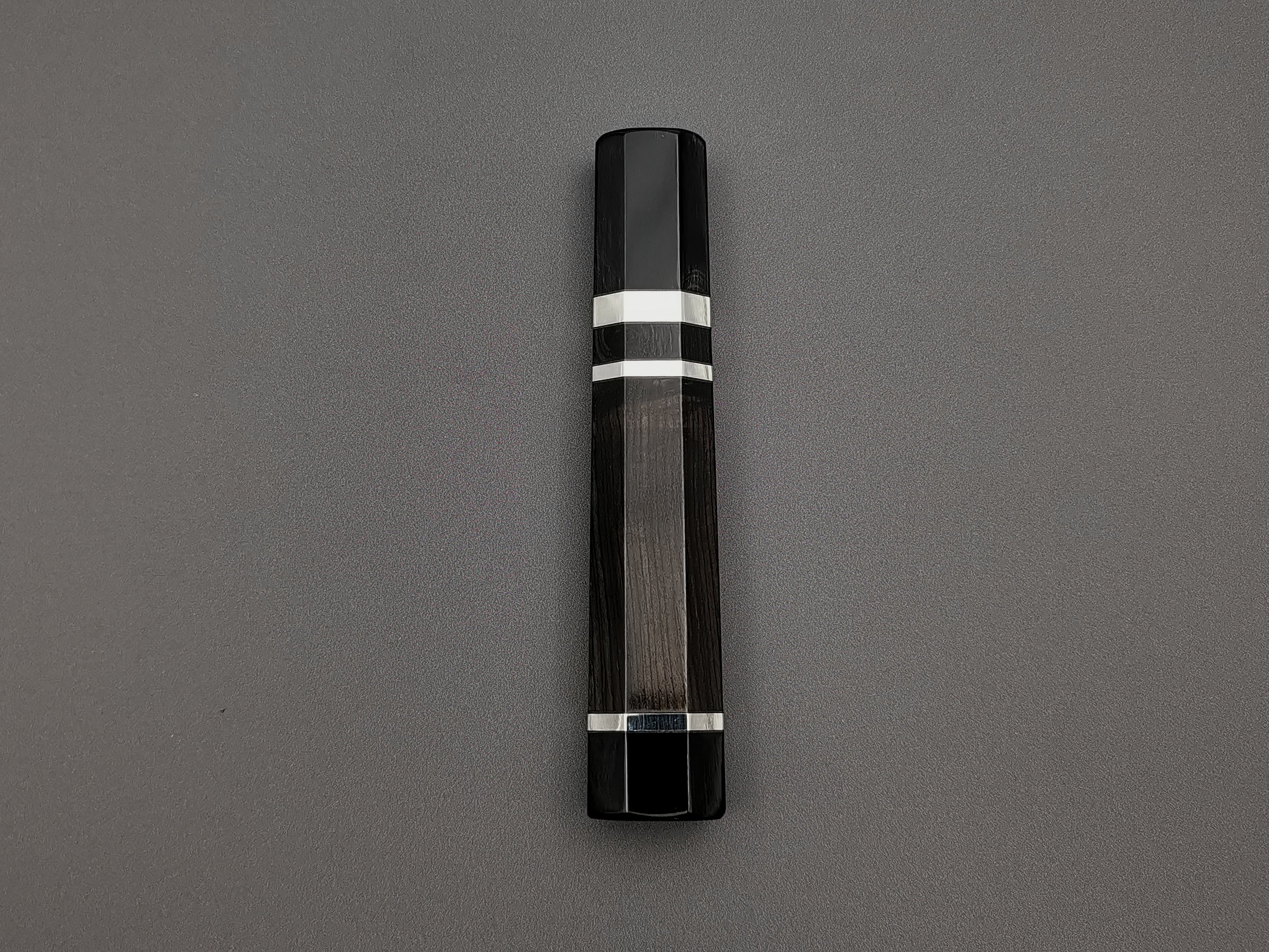 Ebony handle with double black buffalo and triple nickel silver rings