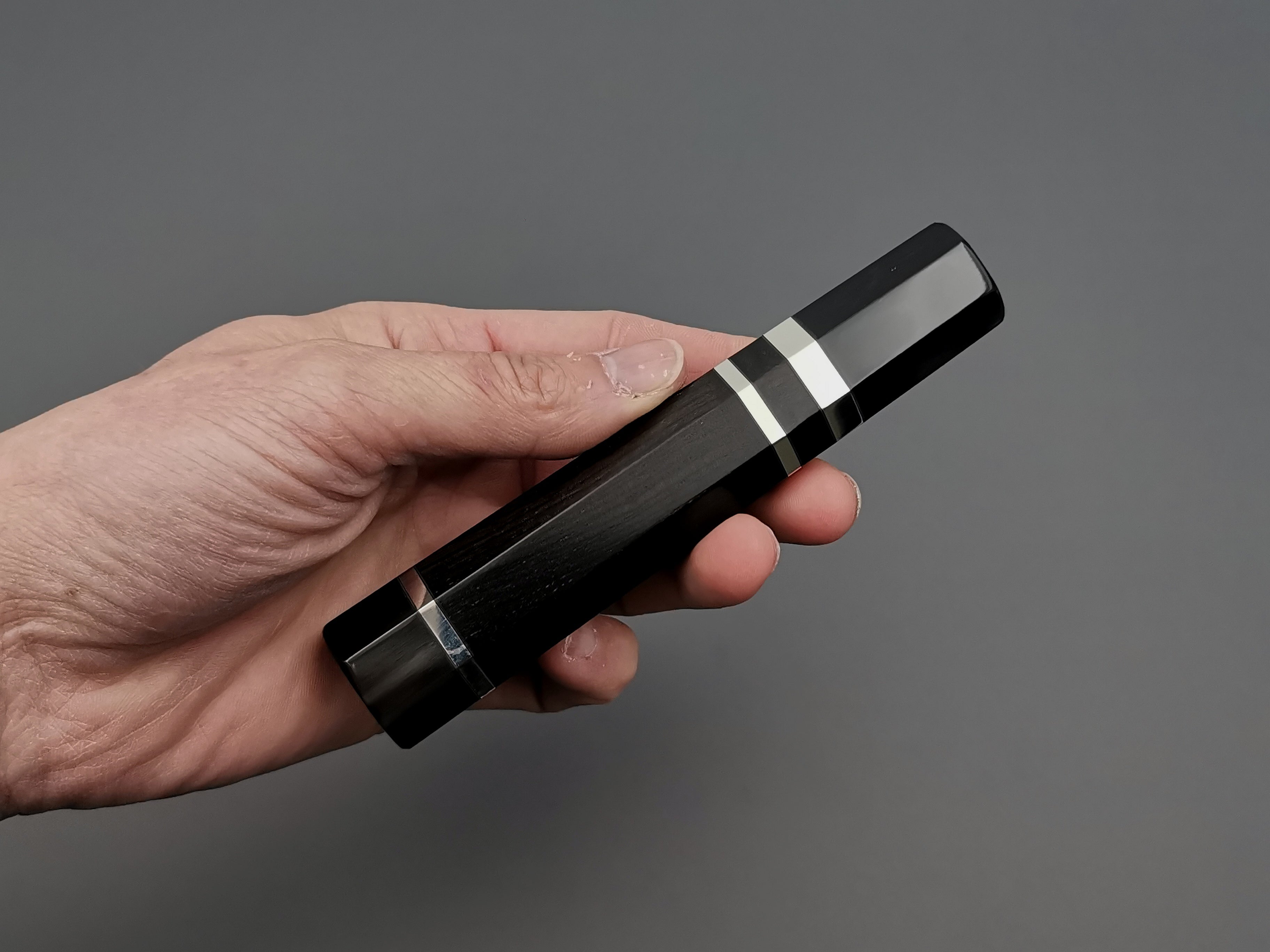 Ebony handle with double black buffalo and triple nickel silver rings