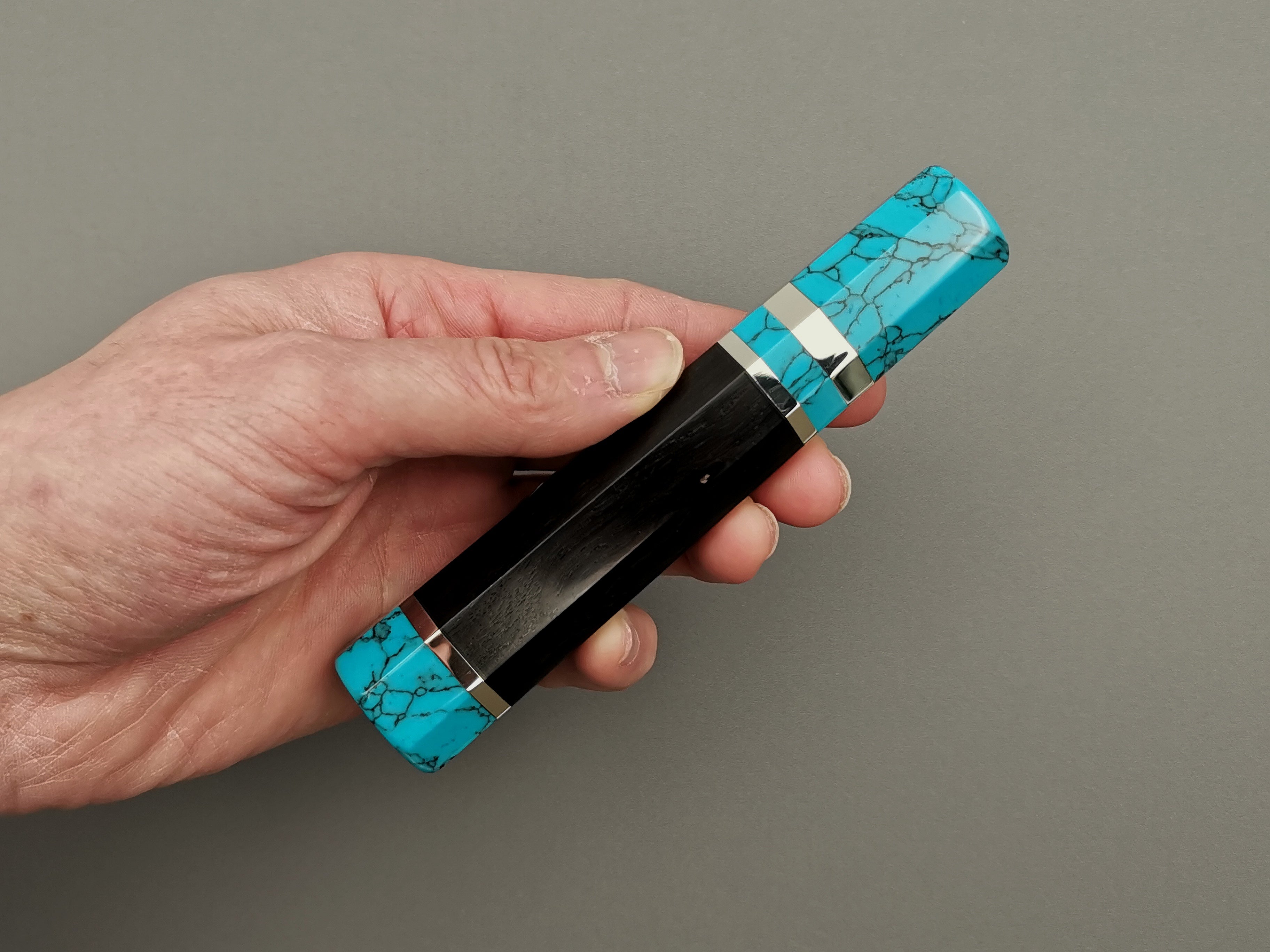 Ebony handle with double turquoise bolster