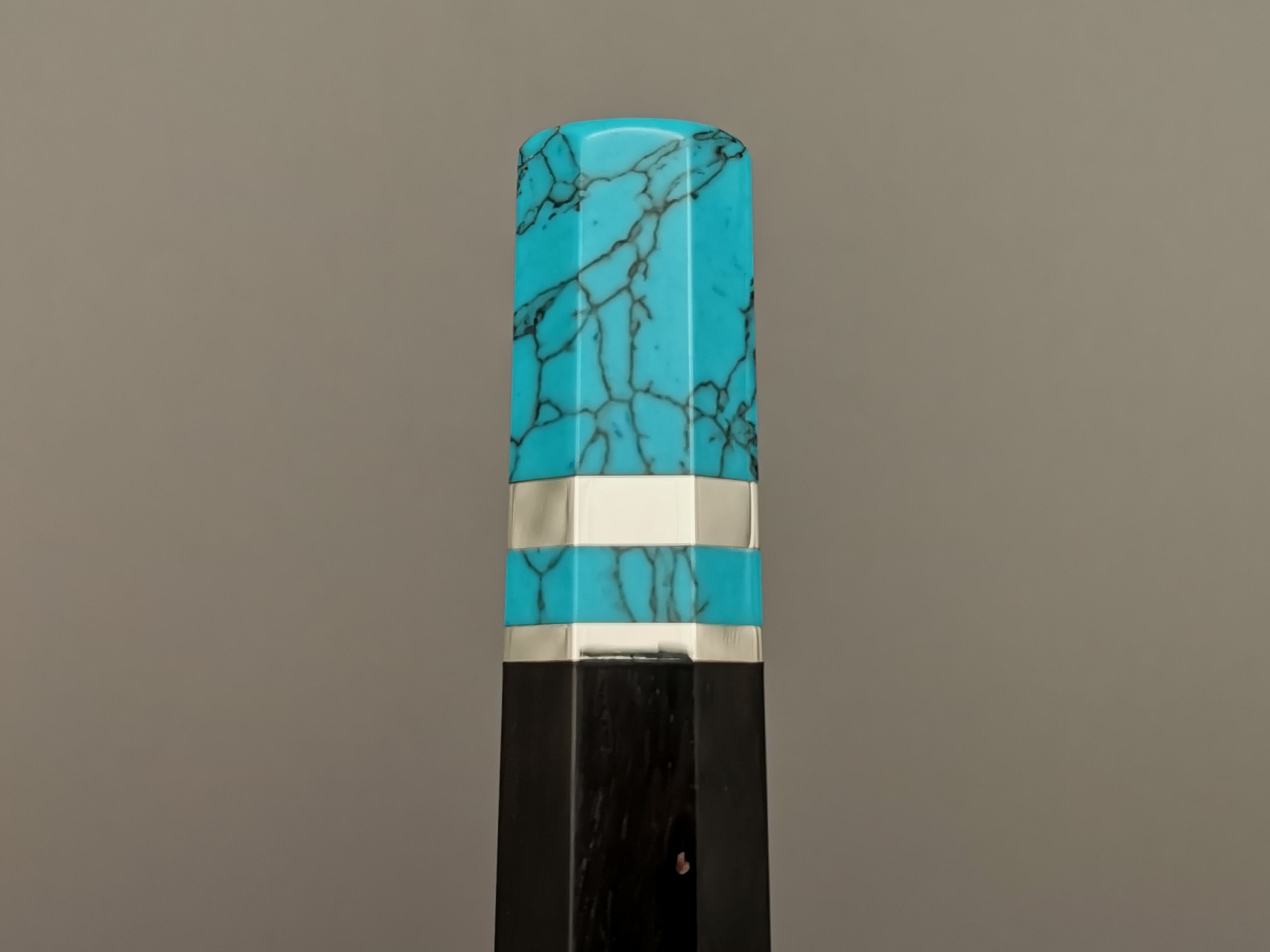 Ebony handle with double turquoise bolster