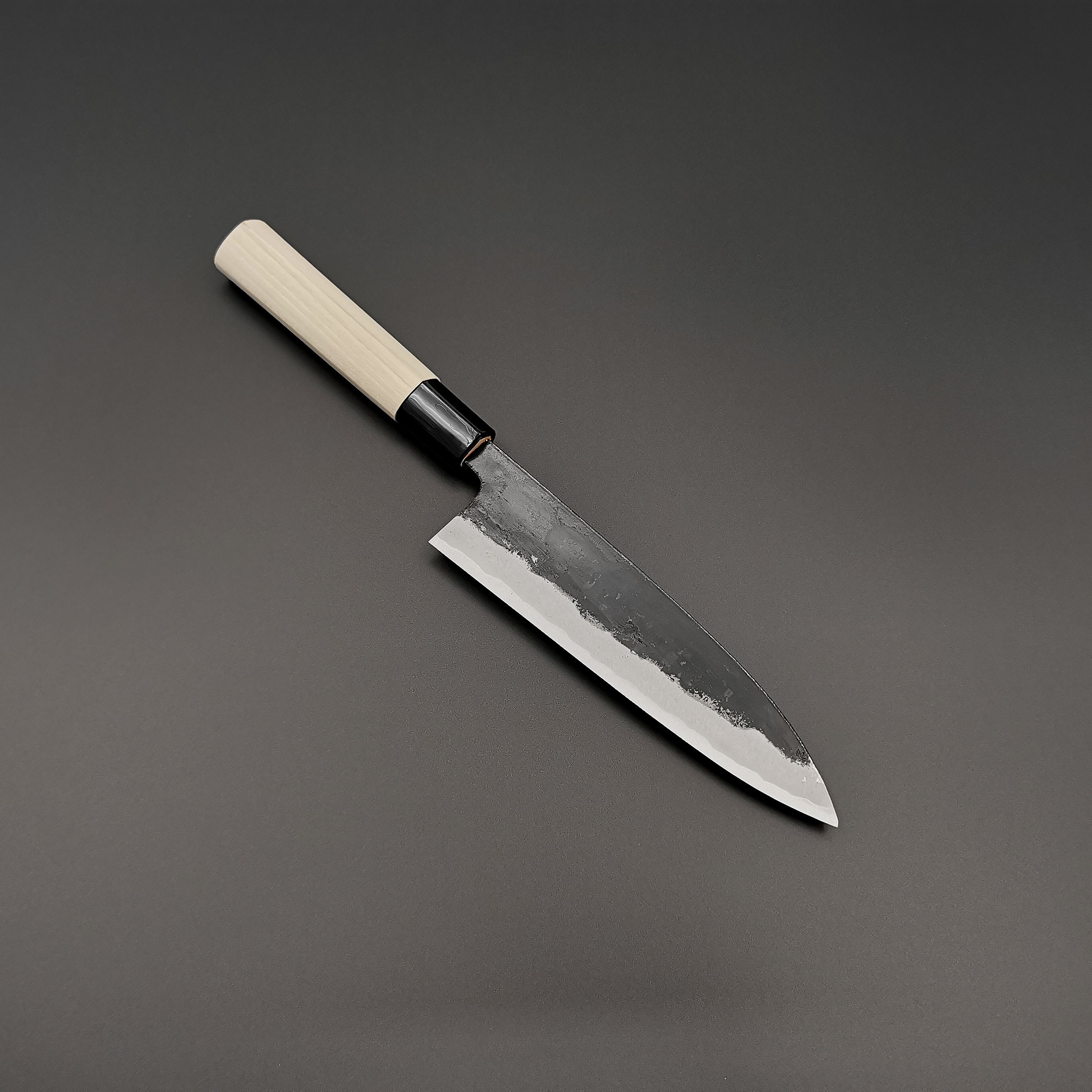 Photo of a Takeo Murata funayuki knife showing blade and handle detail