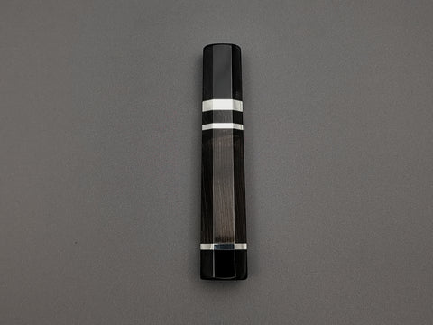 Ebony handle with double black buffalo and triple nickel silver