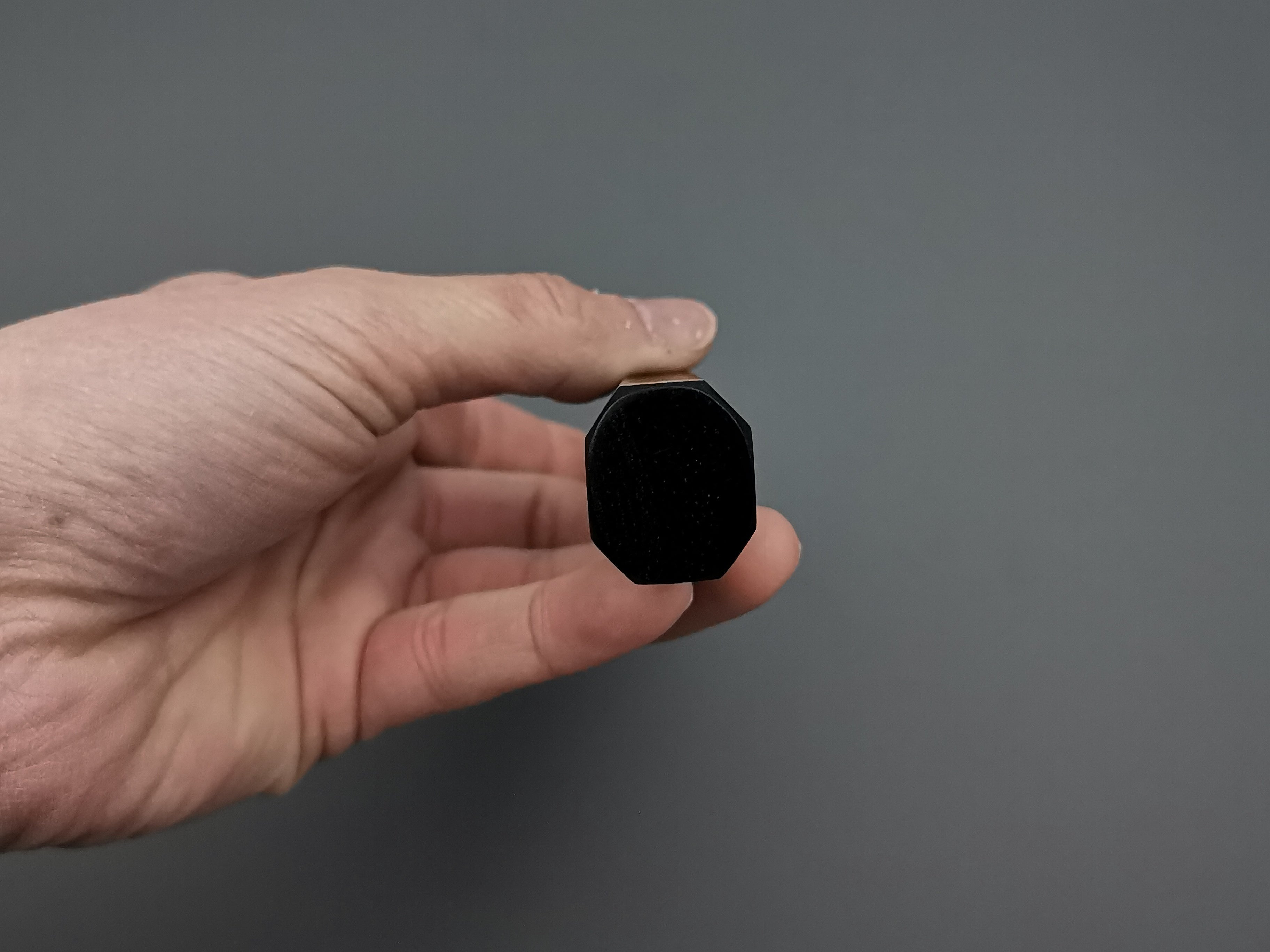 Ebony handle with single marble buffalo horn bolster