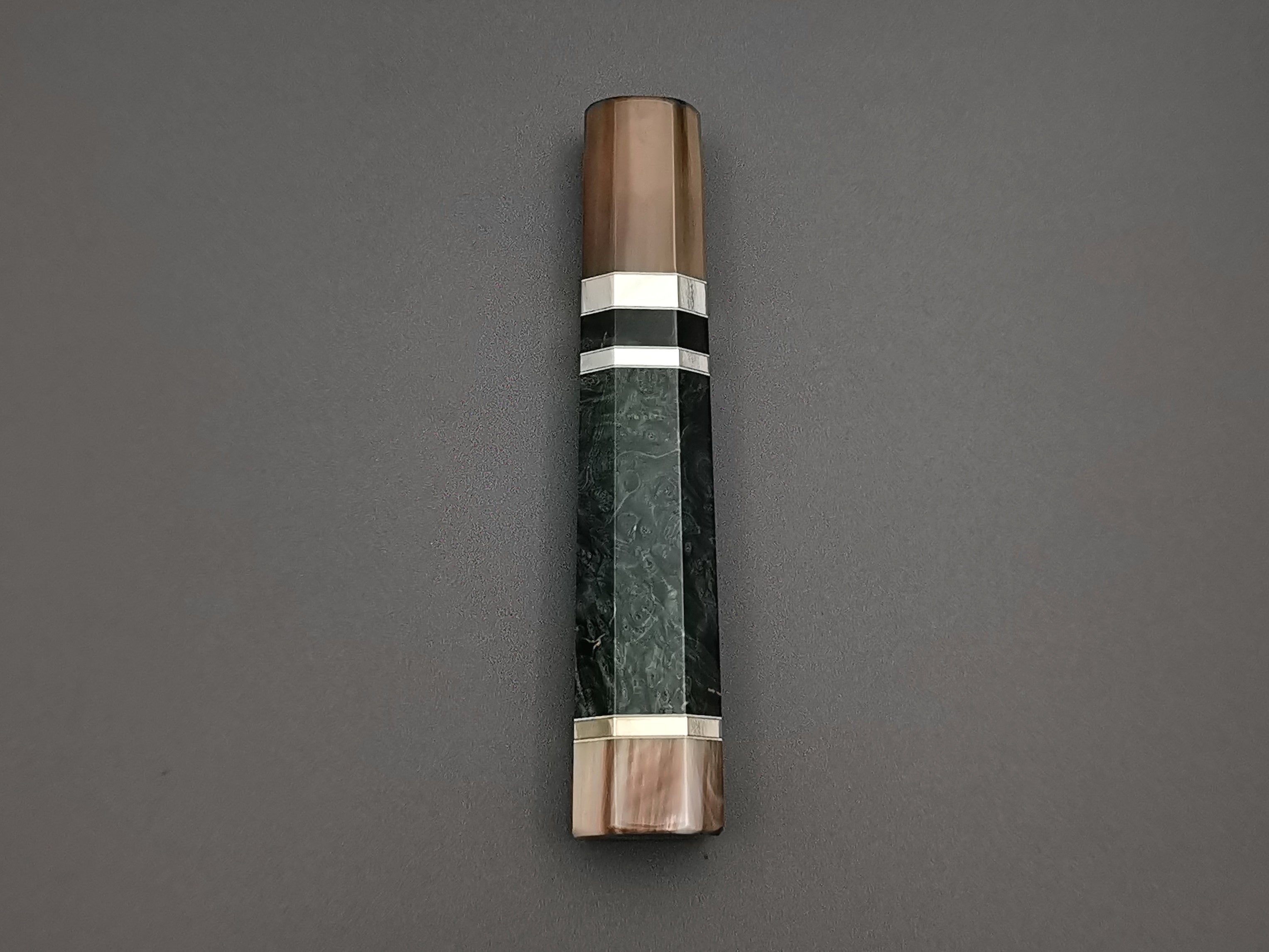 Blue/Green stabilised maple with double marble buffalo horn and triple nickel silver rings