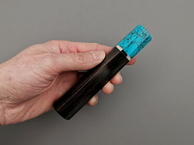 Ebony handle with turquoise bolster