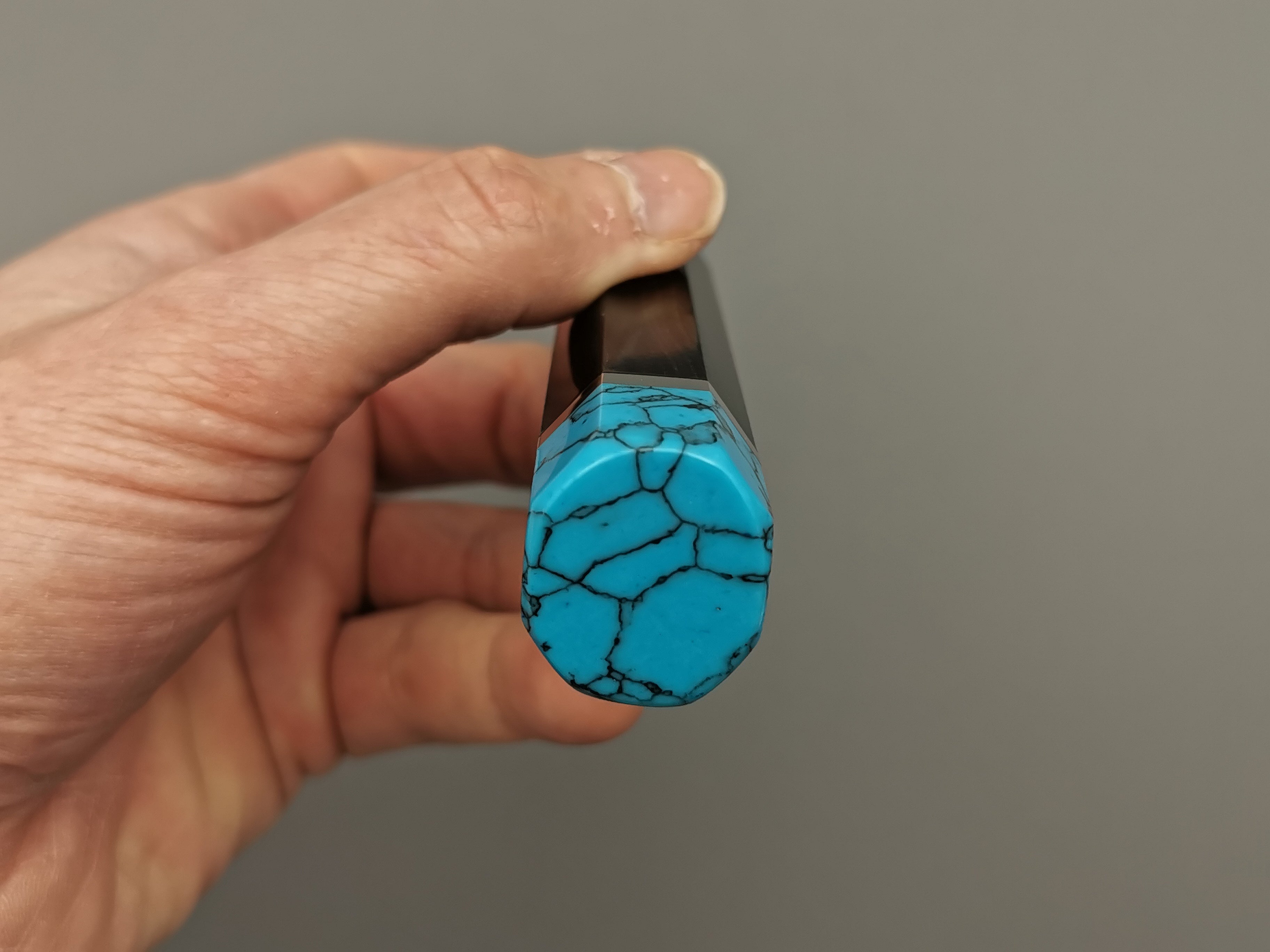 Ebony handle with double turquoise bolster